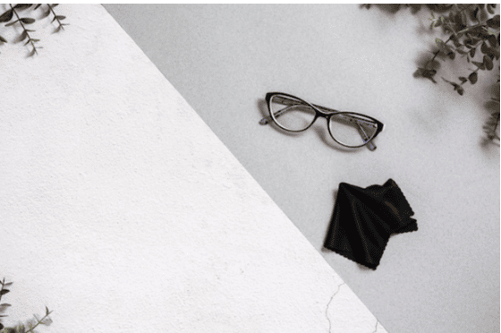 microfiber cloth and glasses on table