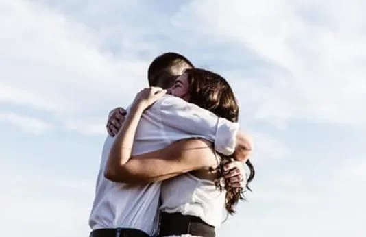 How Covid Brought Long Distance Couples Closer Couples hugging each other